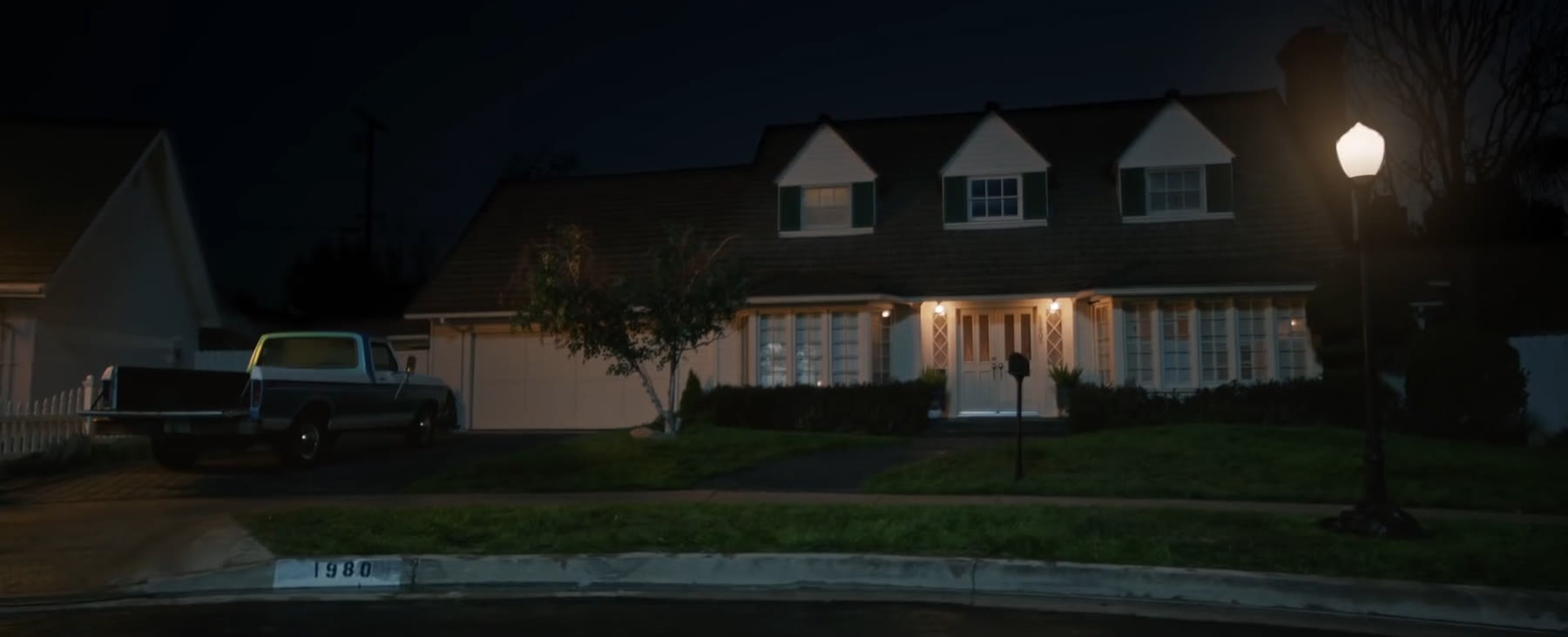 A quiet suburban house at night